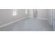 Spacious bedroom with tile flooring and ample natural light at 16117 Medrick Rd, Brooksville, FL 34614