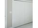 White closet doors in a bedroom at 16117 Medrick Rd, Brooksville, FL 34614