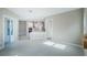 Open kitchen with island, stainless steel appliances, and tile floors at 16117 Medrick Rd, Brooksville, FL 34614