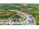 Wide aerial view of community and home location at 21361 Snowy Orchid Ter, Land O Lakes, FL 34637