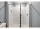 Bathroom with a shower and white subway tile at 21361 Snowy Orchid Ter, Land O Lakes, FL 34637