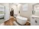 Luxurious bathroom featuring a large soaking tub and walk-in closet at 21361 Snowy Orchid Ter, Land O Lakes, FL 34637