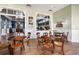Community cafe with tables and chairs for residents at 21361 Snowy Orchid Ter, Land O Lakes, FL 34637