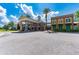 Community center with inviting entrance and landscaping at 21361 Snowy Orchid Ter, Land O Lakes, FL 34637