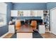 Home office with large desks and ample storage at 21361 Snowy Orchid Ter, Land O Lakes, FL 34637