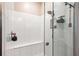 Large walk-in shower with a built-in seat at 21361 Snowy Orchid Ter, Land O Lakes, FL 34637