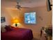 Comfortable bedroom with a cozy bed, ample natural light, and tasteful decor at 2280 Bancroft S Cir # A, Palm Harbor, FL 34683