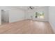 Spacious living room with hardwood floors and neutral walls at 4551 Wilcox Ave, North Port, FL 34288