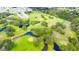 Aerial view of community golf course at 5212 Betmar Dr, Zephyrhills, FL 33542