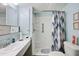 Clean bathroom with shower/tub combo and vanity at 5212 Betmar Dr, Zephyrhills, FL 33542