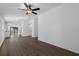 Bright and airy living room featuring hardwood floors and an open floor plan at 11105 Jenny Wren Rd, Weeki Wachee, FL 34614