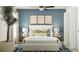 Bedroom with a comfy bed, blue accent wall, and stylish decor at 12214 Radiant Gem Trl, Parrish, FL 34219