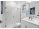 Modern bathroom with a glass-enclosed shower, white subway tile, and a stylish vanity at 13019 Paddock Wood Pl, Riverview, FL 33579