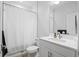 Clean and modern bathroom with a shower, vanity, and white fixtures at 13019 Paddock Wood Pl, Riverview, FL 33579