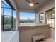 Relaxing hot tub on screened-in patio with serene nature views at 13019 Paddock Wood Pl, Riverview, FL 33579