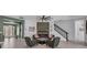 Inviting living room with modern fireplace, accent wall, and comfortable seating arrangement at 13019 Paddock Wood Pl, Riverview, FL 33579