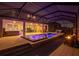 Spacious pool and hot tub with modern screen enclosure at 13019 Paddock Wood Pl, Riverview, FL 33579