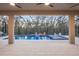 Inviting screened pool and spa with lounge area and fire feature offer a relaxing outdoor experience at 13019 Paddock Wood Pl, Riverview, FL 33579