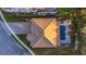 An aerial directly above view of a home's rooftop and backyard pool area at 13019 Paddock Wood Pl, Riverview, FL 33579