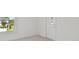 View of a bedroom corner showcasing a large window and white walls at 1530 W River Shore Way, Tampa, FL 33603