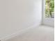 Spacious bedroom with carpet and window with view of backyard at 1530 W River Shore Way, Tampa, FL 33603