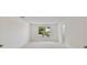 Spacious bedroom with carpet, large window, and white walls at 1530 W River Shore Way, Tampa, FL 33603
