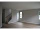 Spacious living area with neutral paint, ready for your personal touch and decor at 1530 W River Shore Way, Tampa, FL 33603