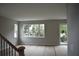 Bright living room with ample natural light, perfect for comfortable living and entertaining at 1530 W River Shore Way, Tampa, FL 33603