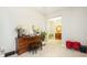 Open living area featuring a console table and decorative items at 16831 Banner Shell Pl, Wimauma, FL 33598