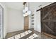 Bright dining room with modern light fixture and barn door at 2230 6Th N Ave, St Petersburg, FL 33713