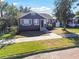 Charming bungalow with gray siding, front porch, and walkway at 2230 6Th N Ave, St Petersburg, FL 33713