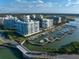 Aerial view of waterfront condos and marina at 3 Seaside Ln # 601, Belleair, FL 33756