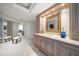 Elegant bathroom with double vanity, large mirror, and upgraded fixtures at 3 Seaside Ln # 601, Belleair, FL 33756