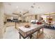 Spacious kitchen features custom cabinetry, an island, and a chandelier at 3 Seaside Ln # 601, Belleair, FL 33756