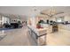 Bright and open kitchen boasts marble floors, a large island, and modern appliances at 3 Seaside Ln # 601, Belleair, FL 33756