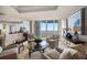 Bright living room with water views, featuring comfortable seating and elegant decor at 3 Seaside Ln # 601, Belleair, FL 33756