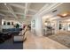 Elegant building lobby with coffered ceilings, seating areas, and marble flooring throughout at 3 Seaside Ln # 601, Belleair, FL 33756
