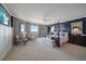 Large main bedroom with a four-poster bed and water views at 3 Seaside Ln # 601, Belleair, FL 33756