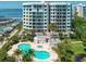 Upscale condo complex featuring sparkling pools, marina access, and beautiful landscaping at 3 Seaside Ln # 601, Belleair, FL 33756