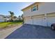 Exterior view showing building and garage at 3210 39Th S St # C, St Petersburg, FL 33711