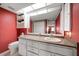 Bathroom features a single vanity, granite countertop and a shower/tub combo at 3954 Sailmaker Ln, Holiday, FL 34691