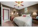 Spacious bedroom featuring a king-size bed and lots of natural light at 3954 Sailmaker Ln, Holiday, FL 34691
