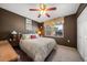 Bright bedroom with a comfortable bed and ample closet space at 3954 Sailmaker Ln, Holiday, FL 34691