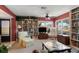 Spacious living room with built-in bookshelves and comfortable seating at 3954 Sailmaker Ln, Holiday, FL 34691