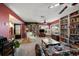 Bright living room featuring ample natural light and cozy furnishings at 3954 Sailmaker Ln, Holiday, FL 34691