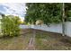 Spacious backyard with a brick pathway at 4511 Helena Ne St, St Petersburg, FL 33703