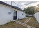 Side yard with access to the patio at 4511 Helena Ne St, St Petersburg, FL 33703