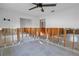 Bedroom under renovation with exposed framing and tile floor at 4511 Helena Ne St, St Petersburg, FL 33703