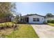 Charming house with landscaped front yard at 4511 Helena Ne St, St Petersburg, FL 33703