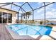 Refreshing pool with water views at 5556 Sabal Trace Dr, North Port, FL 34287